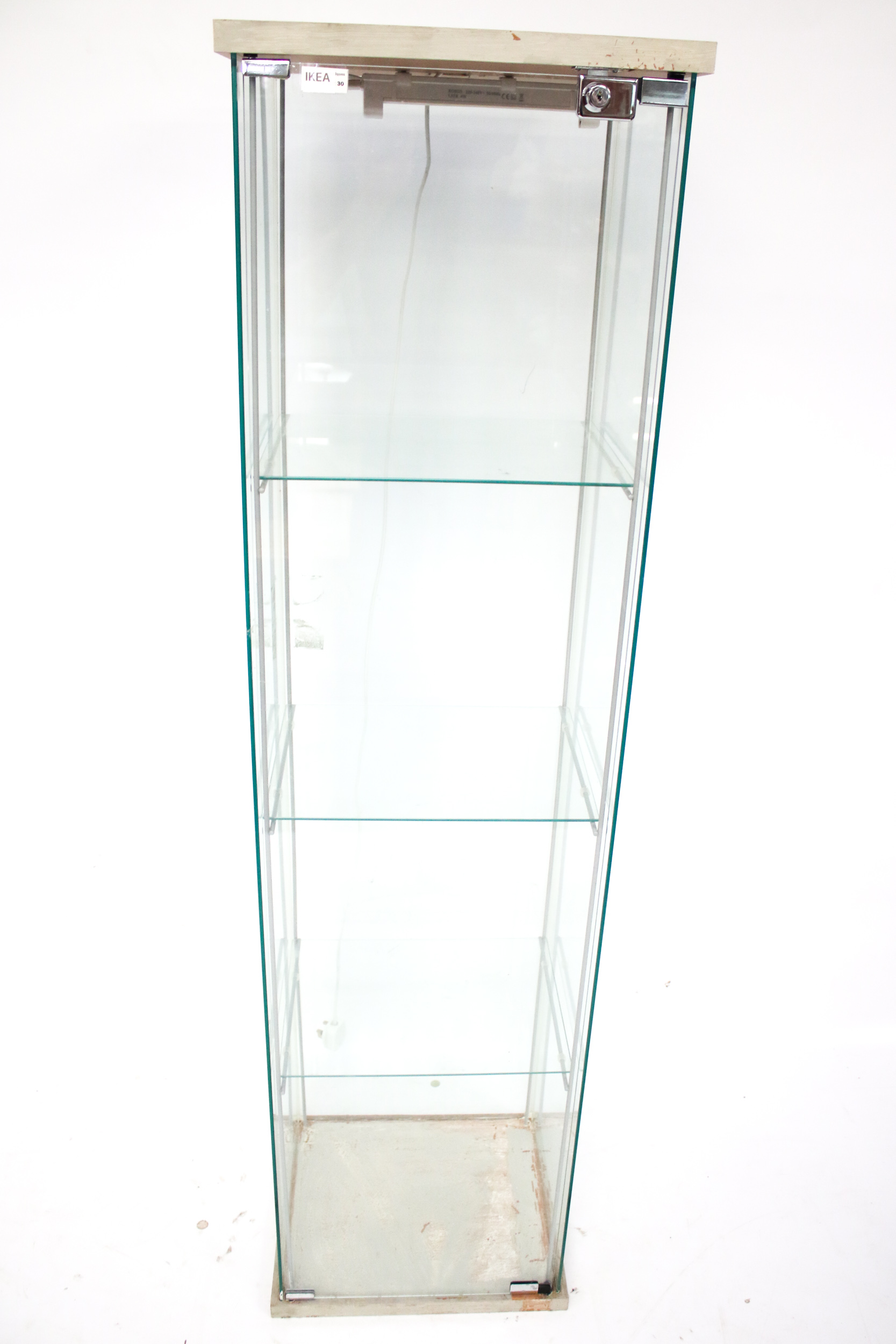 A shop glass display cabinet. With three glass shelves.