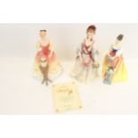 Three Royal Doulton figures signed by Michael Doulton.