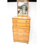 A Vilas mid-century chest of drawers with a mirror.