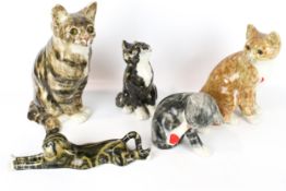 Four Winstanley pottery cats plus one other. In a variety of poses, Max.