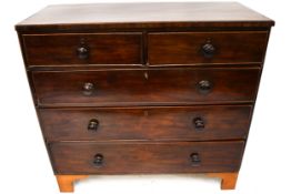 A Victorian mahogany veneered chest of drawers.