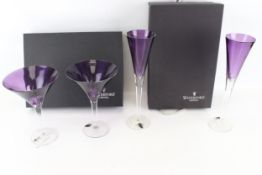 Two pairs of Waterford Crystal drinking glasses.