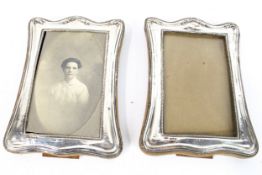A pair of hallmarked silver photo frames.
