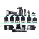 An assortment of camera flash guns. Including examples by Olympus, Praktica, etc.
