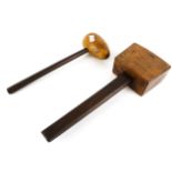 Two vintage wooden mallets.