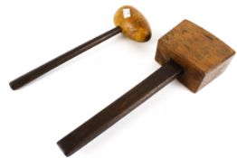 Two vintage wooden mallets.