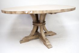 A contemporary stained wooden dining table.