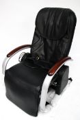 A Neox reclining massage chair. Model 523. Complete with leads, controller and booklet etc.
