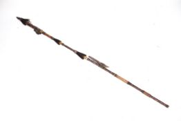 Tribal art. Bamboo ceremonial staff.