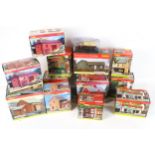 A collection of Hornby OO gauge buildings and track accessories.
