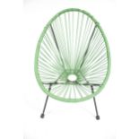 A sage green ovoid Salsa style child's outdoor four-legged chair.