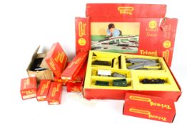 An assortment of OO gauge Tri-ang locomotives, wagons and track.