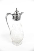A late Victorian silver mounted baluster-shaped glass claret jug.