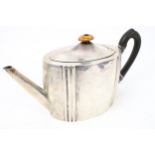A late Victorian silver oval teapot.