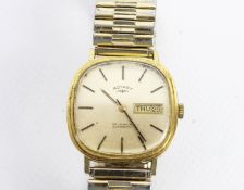 Rotary, a gentleman's Swiss 9ct gold oblong cased automatic day/date wristwatch, circa 1974.