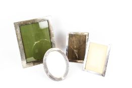 Four 20th century silver photograph frames.