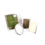 Four 20th century silver photograph frames.