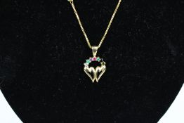 A modern 9ct gold and multi-gem 'Dearest' pendant and chain.
