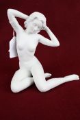 A porcelain Bachman for Kaiser artist's figure.