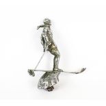 A chrome plated car mascot in the form of a Riley skier.