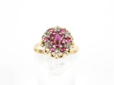 A vintage 9ct gold, ruby and diamond cluster ring.
