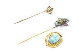Three Victorian and later jewels including a gold knot and bar stick pin.