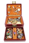 A collection of 19th century and vintage costume jewellery and other items in a burgundy box.