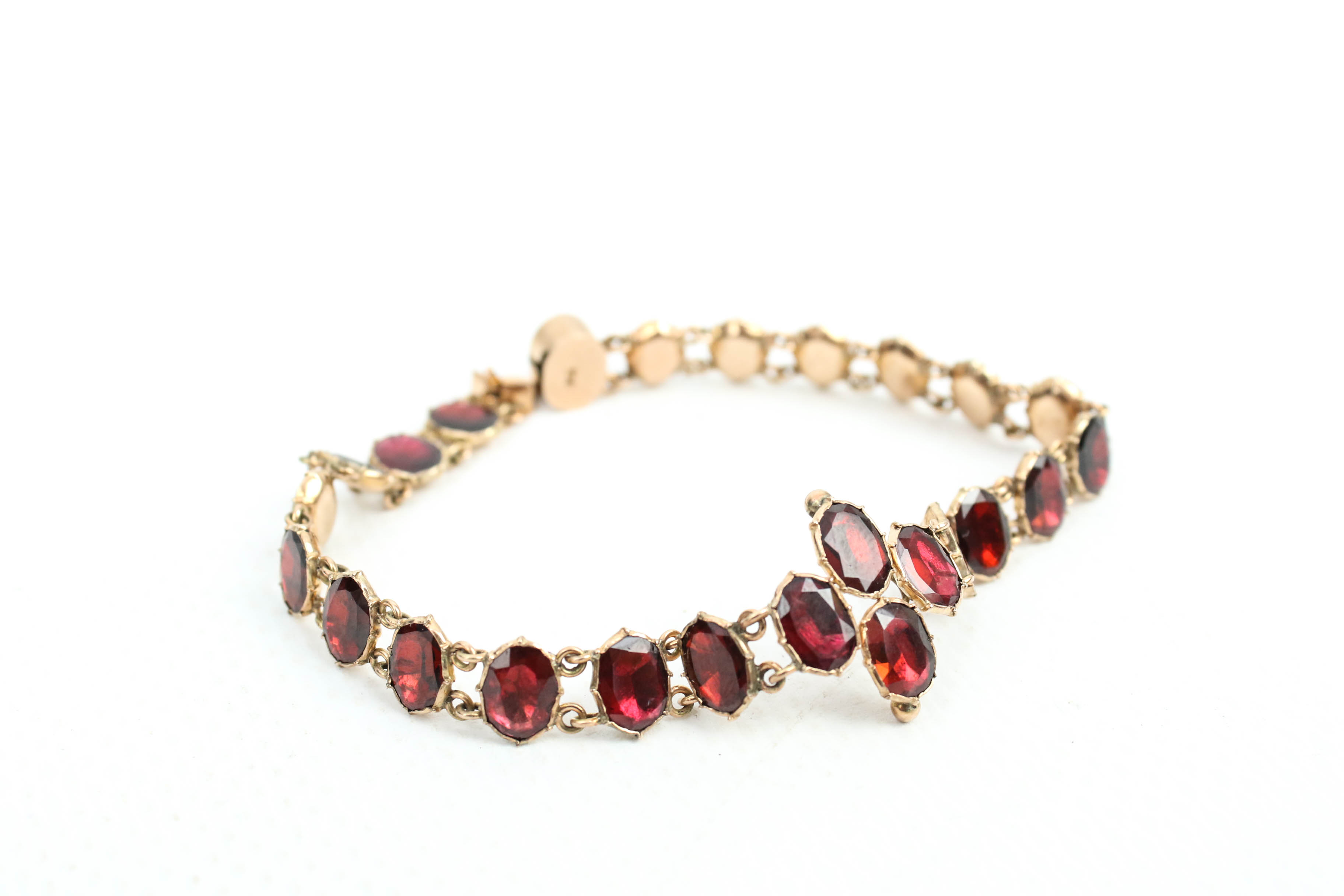 A Victorian rose gold and garnet bracelet in the 18th century style. - Image 4 of 5