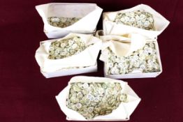 A box of approximately 5,000 mid 20th century vintage mother of pearl shirt buttons.