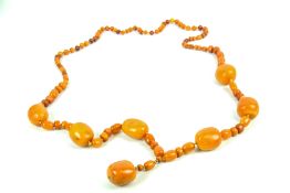 An early 20th century amber bead necklace.