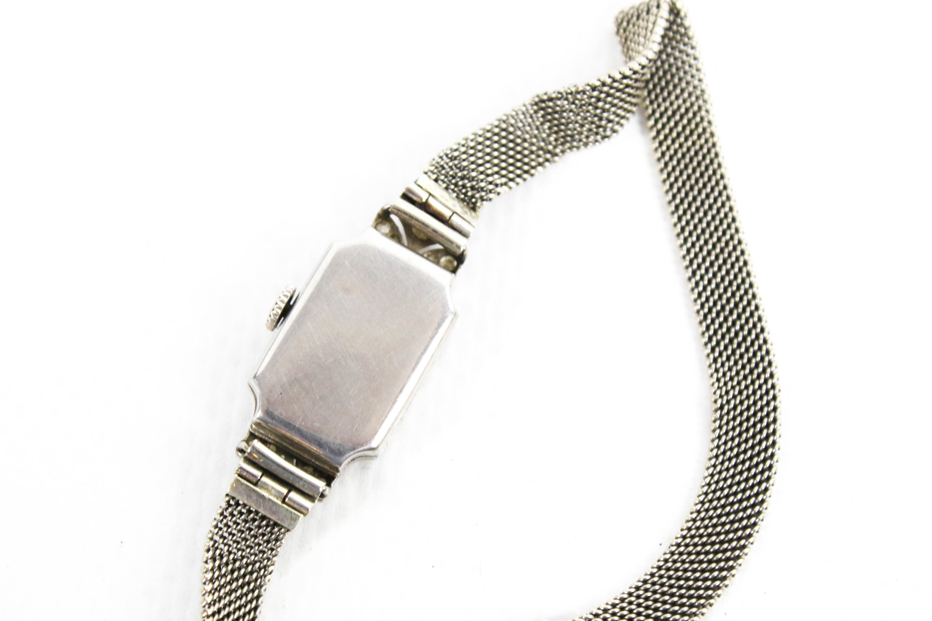 A lady's Art Deco platinum and diamond rectangular bracelet watch. - Image 4 of 4