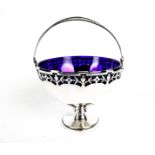 A silver pedestal sugar bowl.