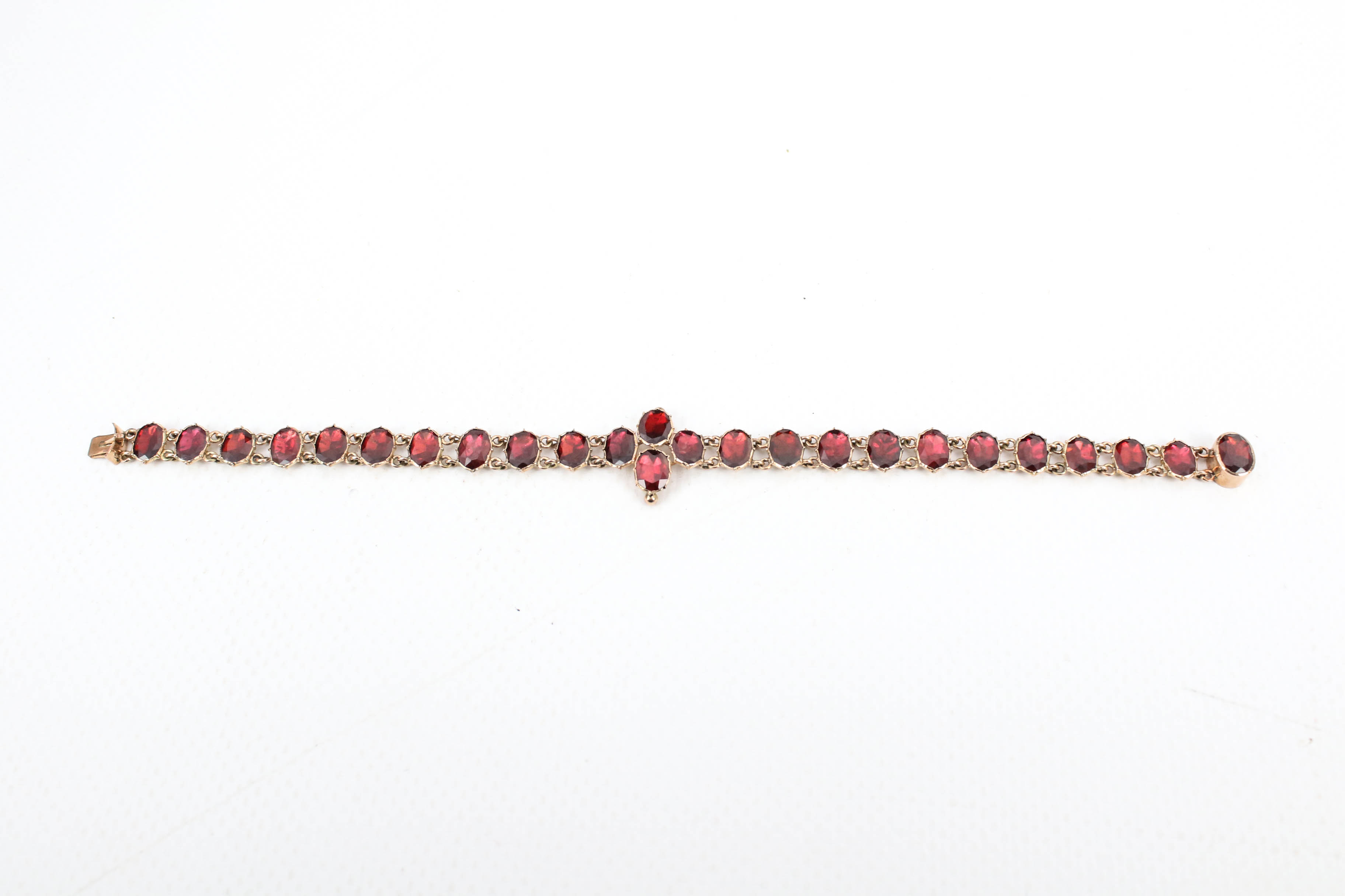 A Victorian rose gold and garnet bracelet in the 18th century style. - Image 3 of 5