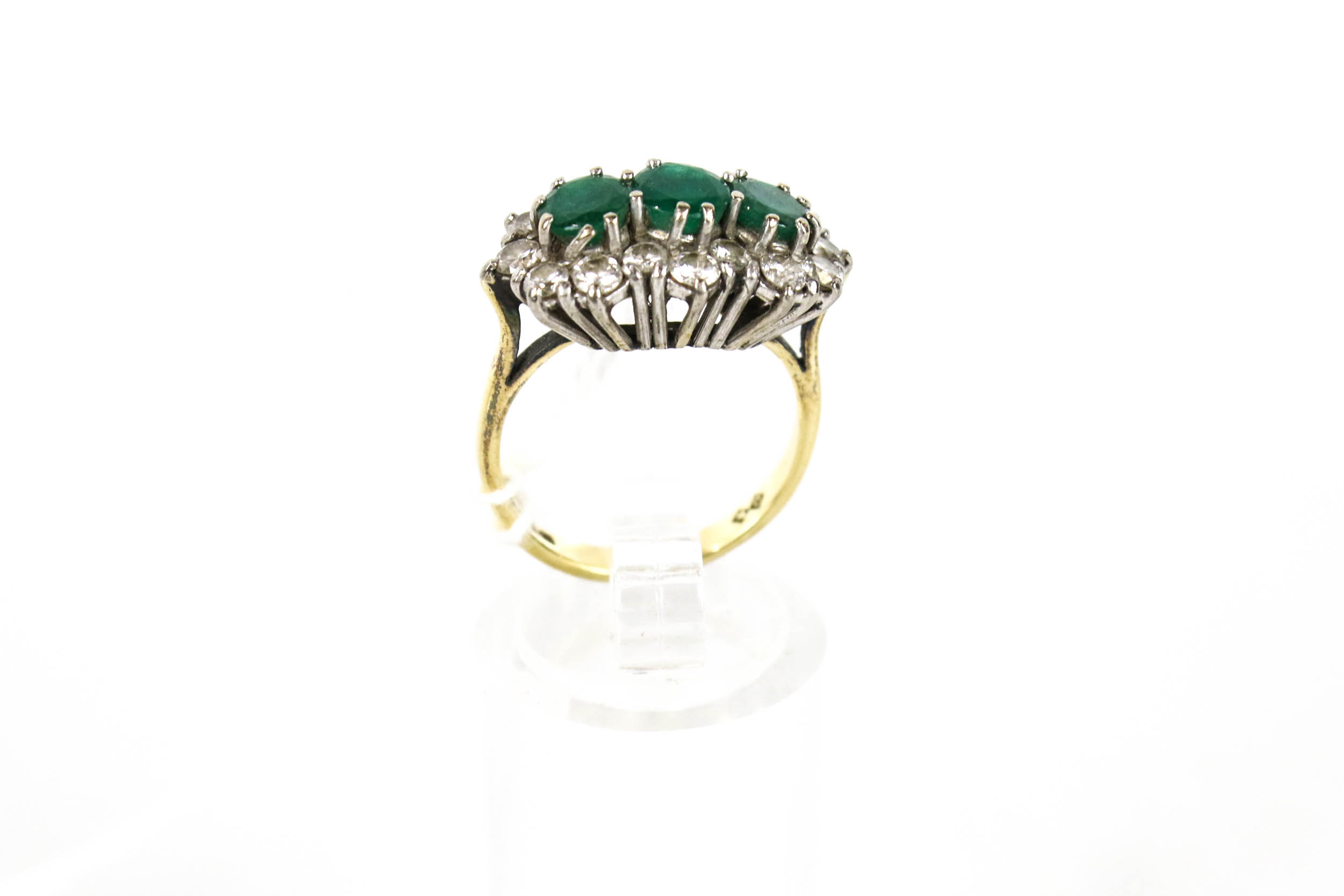 A vintage gold emerald and diamond triple-cluster ring. - Image 2 of 2