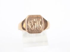 An early 20th century rose gold canted-rectangular signet ring.