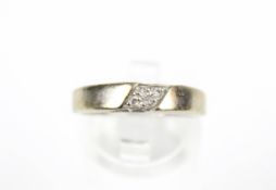 A vintage 9ct gold and tiny diamond eight stone dress ring.