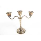 A silver two branch/three light candelabrum.