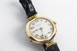 An early 20th century lady's Swiss 9ct gold cased round wristwatch, circa 1925.