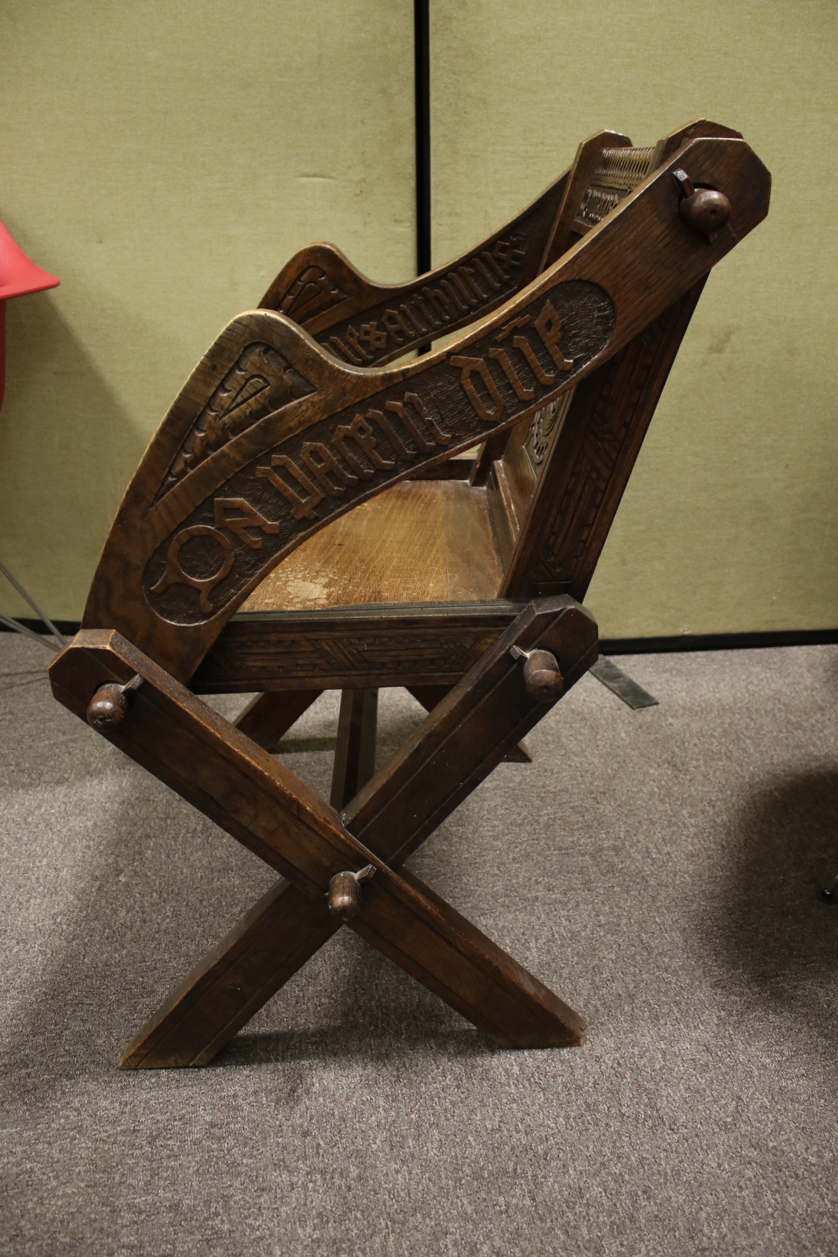 A late 19th century oak 'Glastonbury' chair. - Image 4 of 7