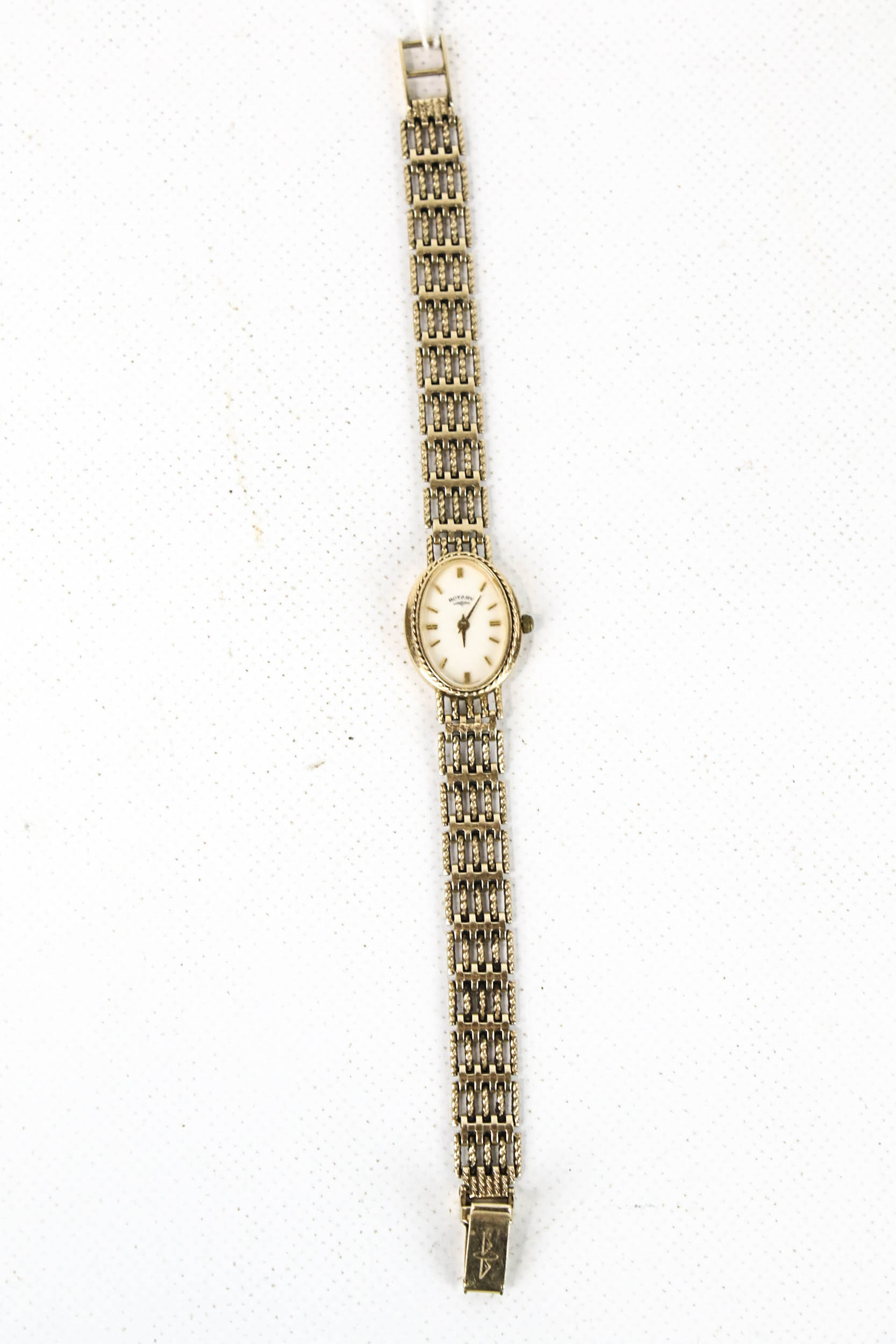 Rotary, a vintage lady's 9ct gold oval bracelet watch, circa 1996.