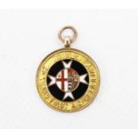 G.W.R. Interest, a 9ct gold and enamel '25 Years First Aid Efficiency' medallion.