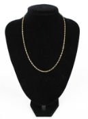 A modern 9ct gold fancy rope-twist necklace.