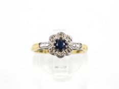An early 20th century gold, sapphire and diamond cluster ring, circa 1930.
