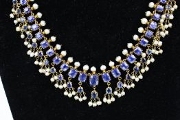 An early 20th century sapphire and cultured-pearl fringe necklace in Indian style.