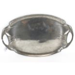 An Art Nouveau oval pewter two-handled tray by Hutton, Sheffield.
