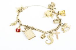 A vintage 9ct gold curb link 'charm' bracelet.