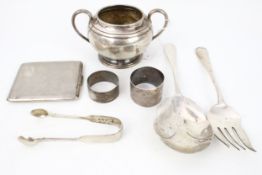 A small collection of silver including a round two-handled sugar bowl on foot. Mark of Atkin Bros.