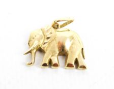 A vintage pendant in the form of an elephant.