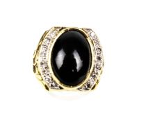 A black onyx and diamond American college style ring.