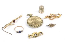 A small collection of Victorian and later jewellery including three gold brooches.